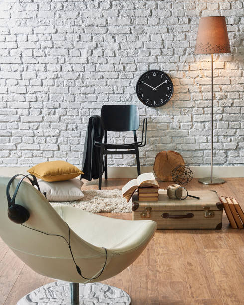 istock modern home interior study room with white brick wall and old suitcase 1320456473