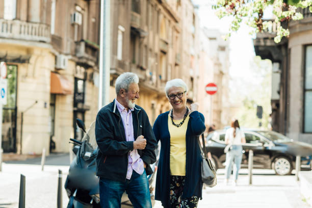 istock Seniors enjoying a city walk 1320457980