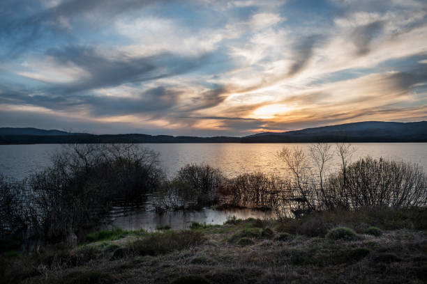 istock Sunset over beautiful lake 1320462213