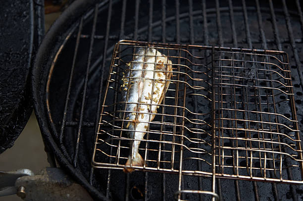 istock Barbecued fish on the grill 132046262