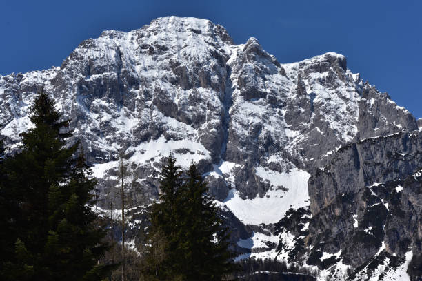 istock Dolomites mountains peak with snow in Comelico Valley, Italy 1320466082