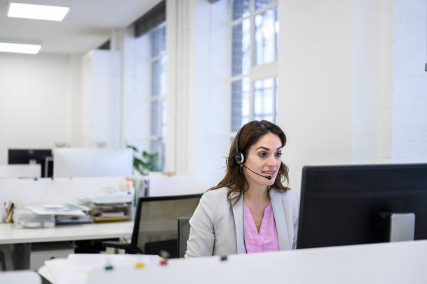 istock Woman working in modern call centre office 1320467079