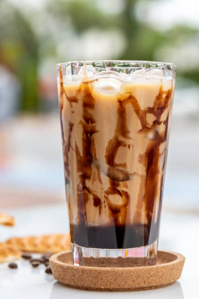 istock Iced caramel latte coffee in a tall glass with caramel syrup 1320467378