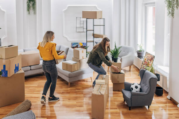 istock Couple unpacking in new home 1320467432
