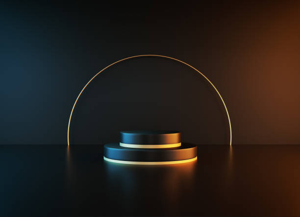istock Black Podium Illuminated By Spotlights Before Black Background 1320467627