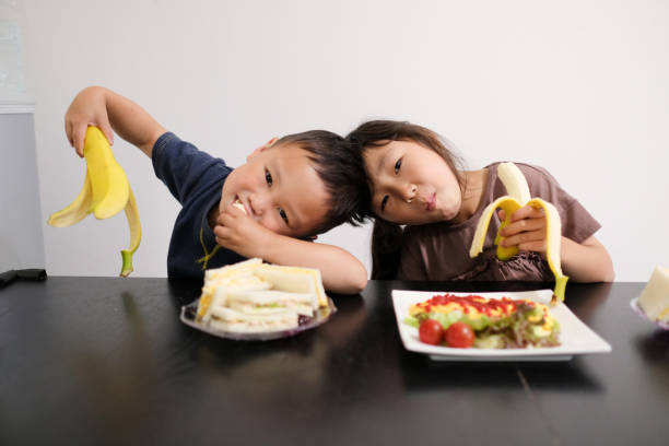 istock Portrait of happy siblings 1320467671