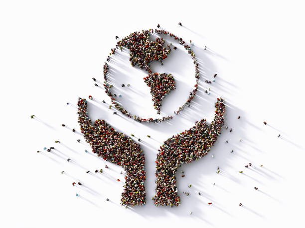 istock Human Crowd Forming World Shape Above Human Hands Symbol : Sustainability Concept 1320467713