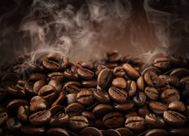 istock Pile of roasted coffee beans, closeup view 1320467753