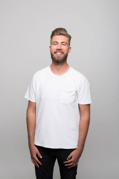 istock Headshot of friendly young man 1320467813