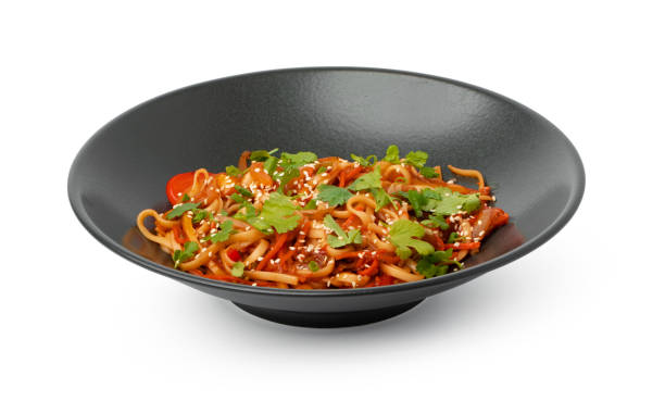 istock Bowl with asian wok noodles isolated on white 1320468396