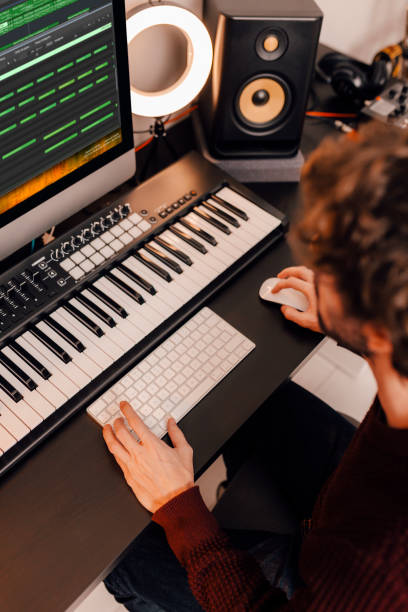 istock Music producer working at home music studio 1320468817