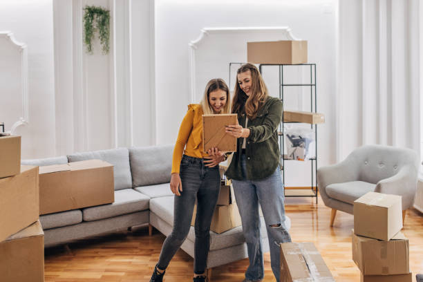 istock Lesbian couple in new home 1320468974