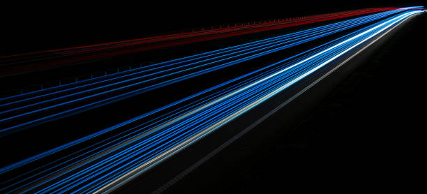 istock abstract red car lights at night. long exposure 1320470616