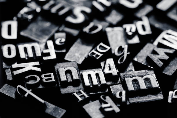 istock Vntage metal letterpress type background 1320470712