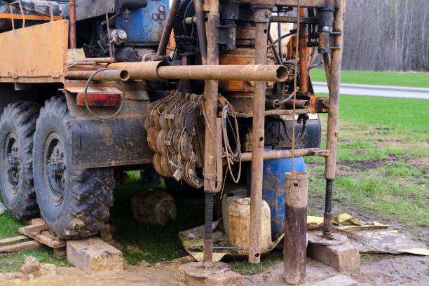 istock Drilling the earth to take samples of soil layers for geology 1320471587