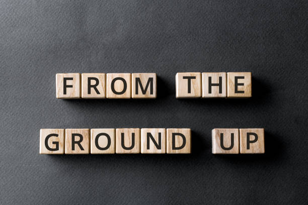 istock From the ground up - phrase from wooden blocks with letters 1320473282