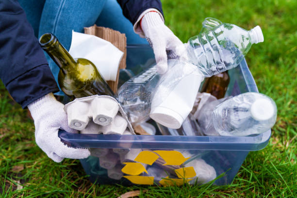 istock Volunteer cleaning up park and recycle 1320475324