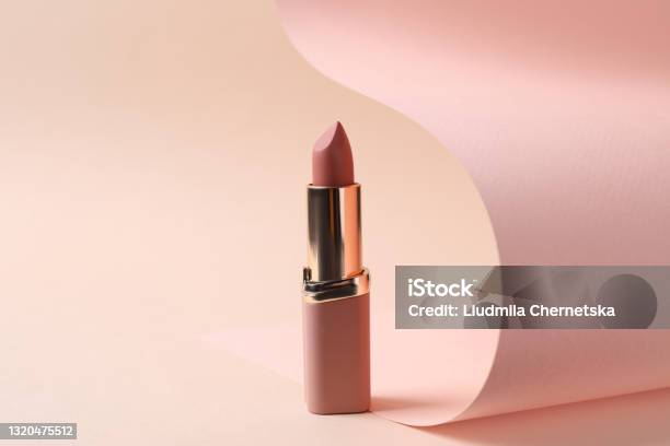 Beautiful Lipstick On Beige Background Professional Makeup Product Stock Photo - Download Image Now