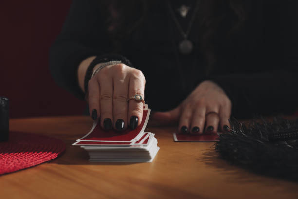 istock Soothsayer predicting future with cards at table indoors, closeup 1320478173