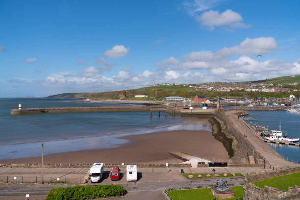 Whitehaven UK harbour walls with motorhomes and campervan parked