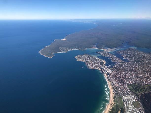 istock Aerial coastline and deep blue sea 1320481340