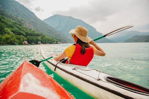 istock Relaxing kayak ride on a calm lake 1320482502