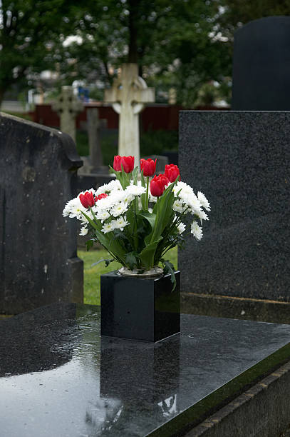 istock Churchyard cemetery flowers 132048267