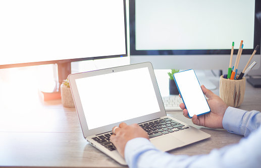 A businessman using his laptop at work