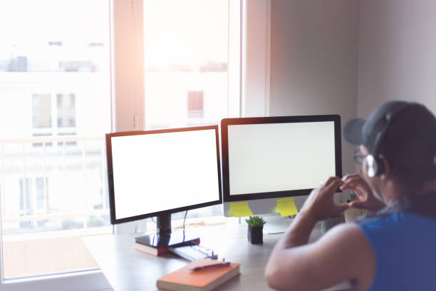 istock businessman with headphones at work 1320483347
