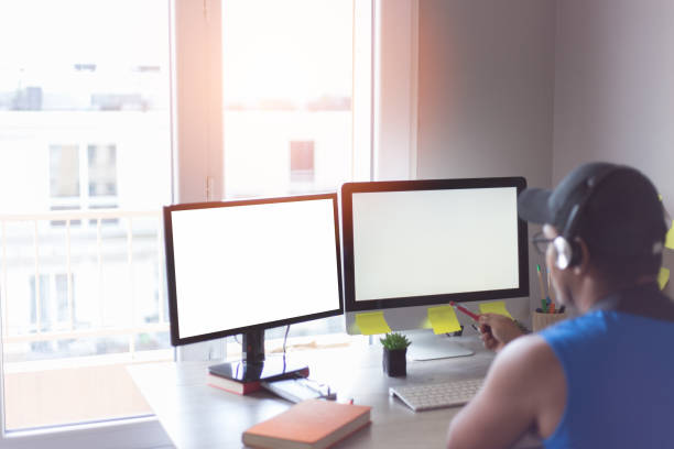 istock businessman with headphones at work 1320483350