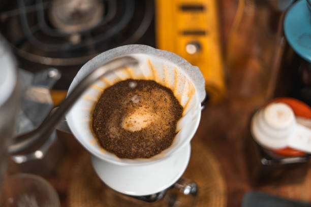 istock Pouring a hot water over a drip coffee 1320483716
