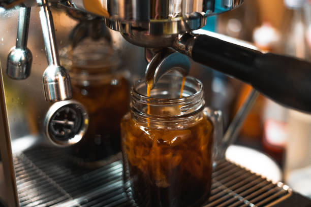 istock Coffee-Make coffee from the machine at home,Coffee in a cup 1320483944