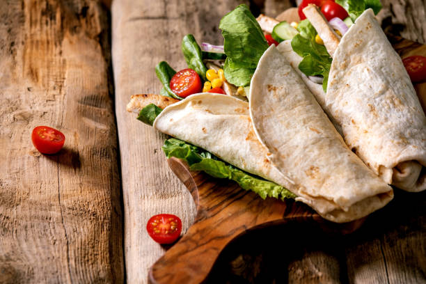 istock Traditional mexican tortila wrap with pork meat 1320484310