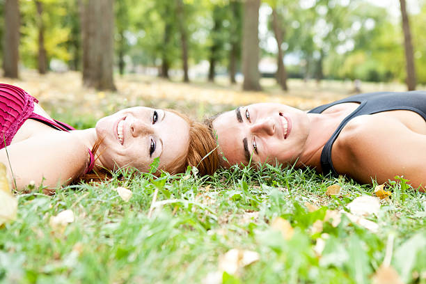 istock love couple lying on grass 132048499