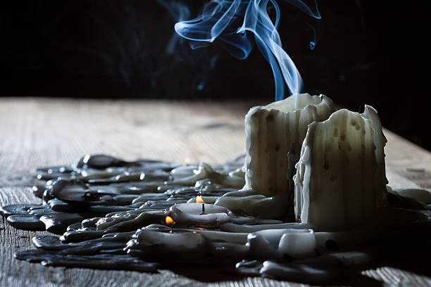 Blue smoke from candles  melting wax stock pictures, royalty-free photos & images
