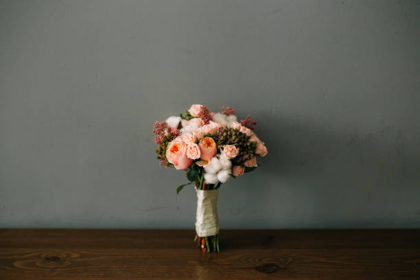 istock Flower Bouquet On Table Against Wall 1320486307