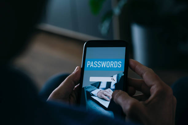 istock man uses a password manager app in his smartphone 1320487136