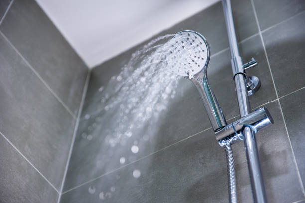 Shower head with falling water Shower head with falling water shower head stock pictures, royalty-free photos & images