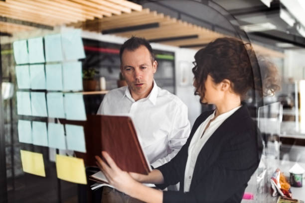 istock Business team discussing over business ideas. 1320495197