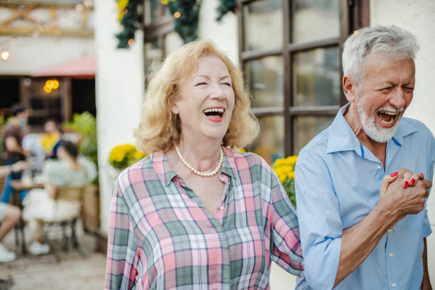 istock Excited senior couple are walking together 1320498011