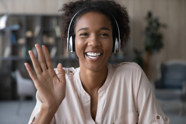 istock Young african american woman holding web camera call. 1320498040