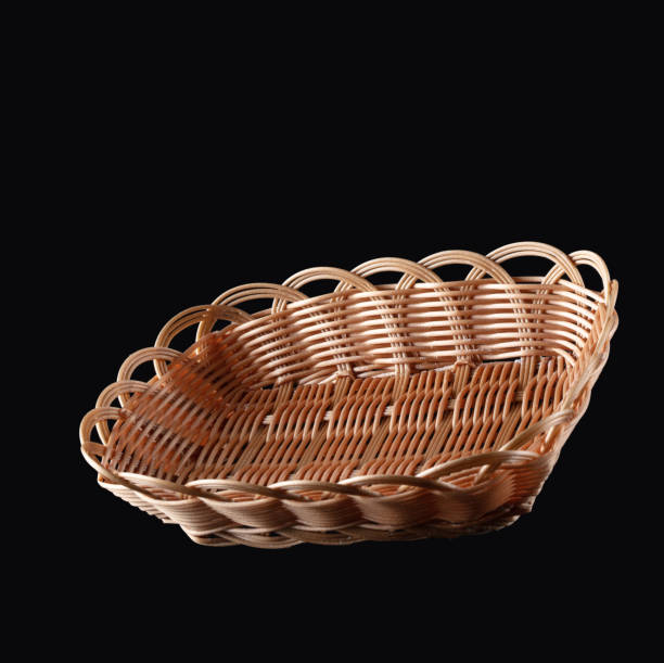 istock Wicker basket for bread isolated on black background. 1320503895