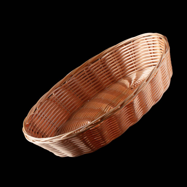 istock Wicker basket for bread isolated on black background. 1320503988