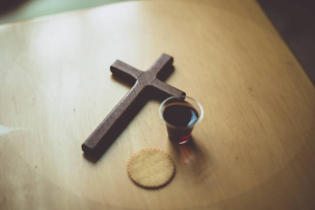 istock Bread and grape juice Christian ceremony 1320505579