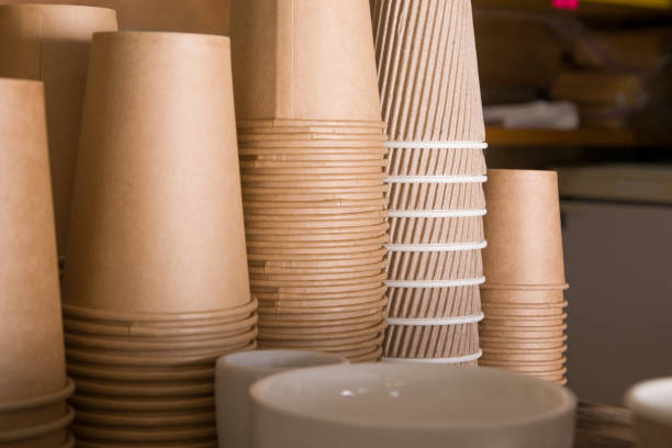 istock Lots of cardboard cups for takeaway coffee and tea, selective focus 1320507973