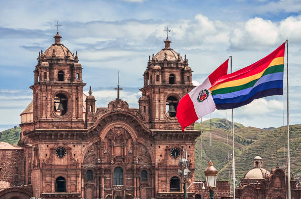 istock View of Cusco cathedral with peruvian and wiphala flags 1320508915