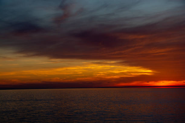 istock Beautiful dusk sea and orange sky 1320509741