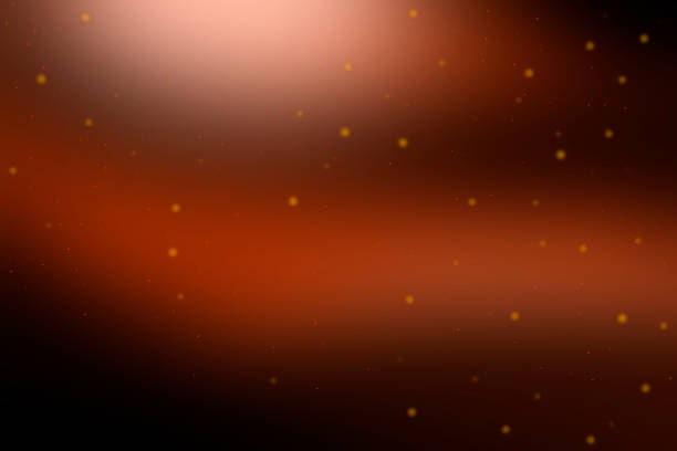 istock Black and burgundy bokeh with particles of stardust. 1320517967