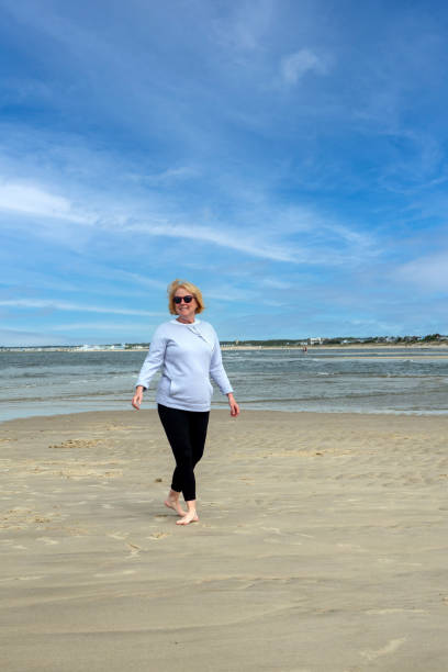 istock walking on the beach in Lewes, Delaware 1320522652