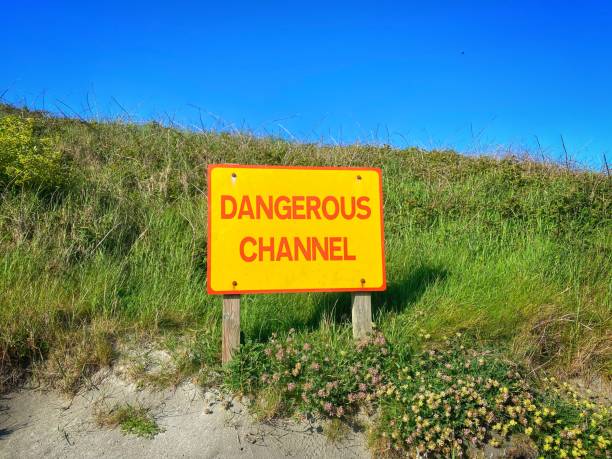 istock Dangerous Channel sign at a beach 1320525189